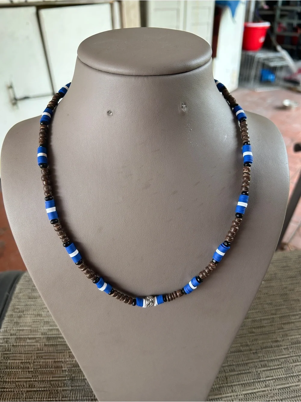 Wooden men beaded